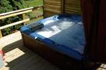 Amazing state-of-the-art outdoor hot tub in secluded decking.