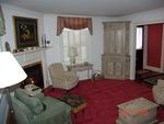 Livingroom with fireplace and TV