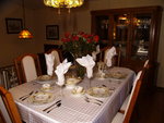 Formal Dining Room with Bay Window's overlooking serene private, treed backyard