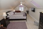 Queen bedroom, vaulted ceilings, 32' flat TV