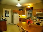 The spacious eat-in kitchen is fully equipped for your comfort and includes a fridge/freezer, stove/oven, microwave, toaster, kettle and coffee maker.<br>Complimentary coffee and tea is included.