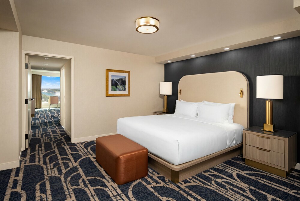 Junior Presidential Suite | Premium Fallsview Suite | One King Bed | (Air-Jetted Tub) view 1.