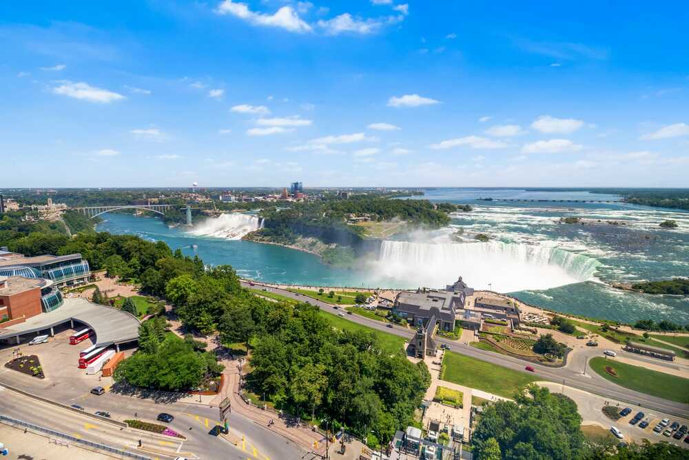 2 Queen Beds American and Niagara Falls View with Sofa Bed - Floor 40 view 1.